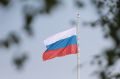 В Новом Уренгое под звуки гимна РФ подняли самый большой триколор на Ямале